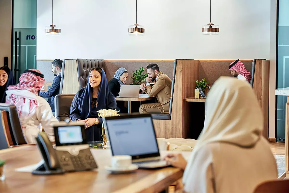 A vibrant Servcorp coworking space in Saudi Arabia, where professionals work, meet, and collaborate in a premium setting.